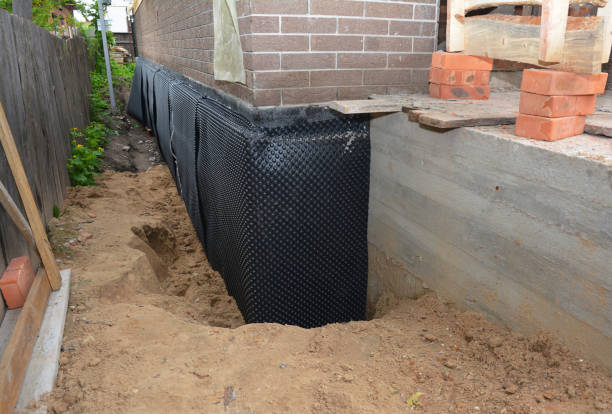 Happy homeowners after waterproofing job in Talbott